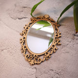 Ornate Oval Cutwork Mirror